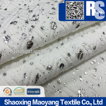 KNITTED POLY DOUBLE JACQUARD FABRIC IN P/D WITH FOIL