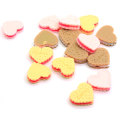 Biscuits en forme de coeur de haute qualité perles de résine 100 pièces / sac pour enfants jouet artisanat fait main décoration entretoise réfrigérateur décor