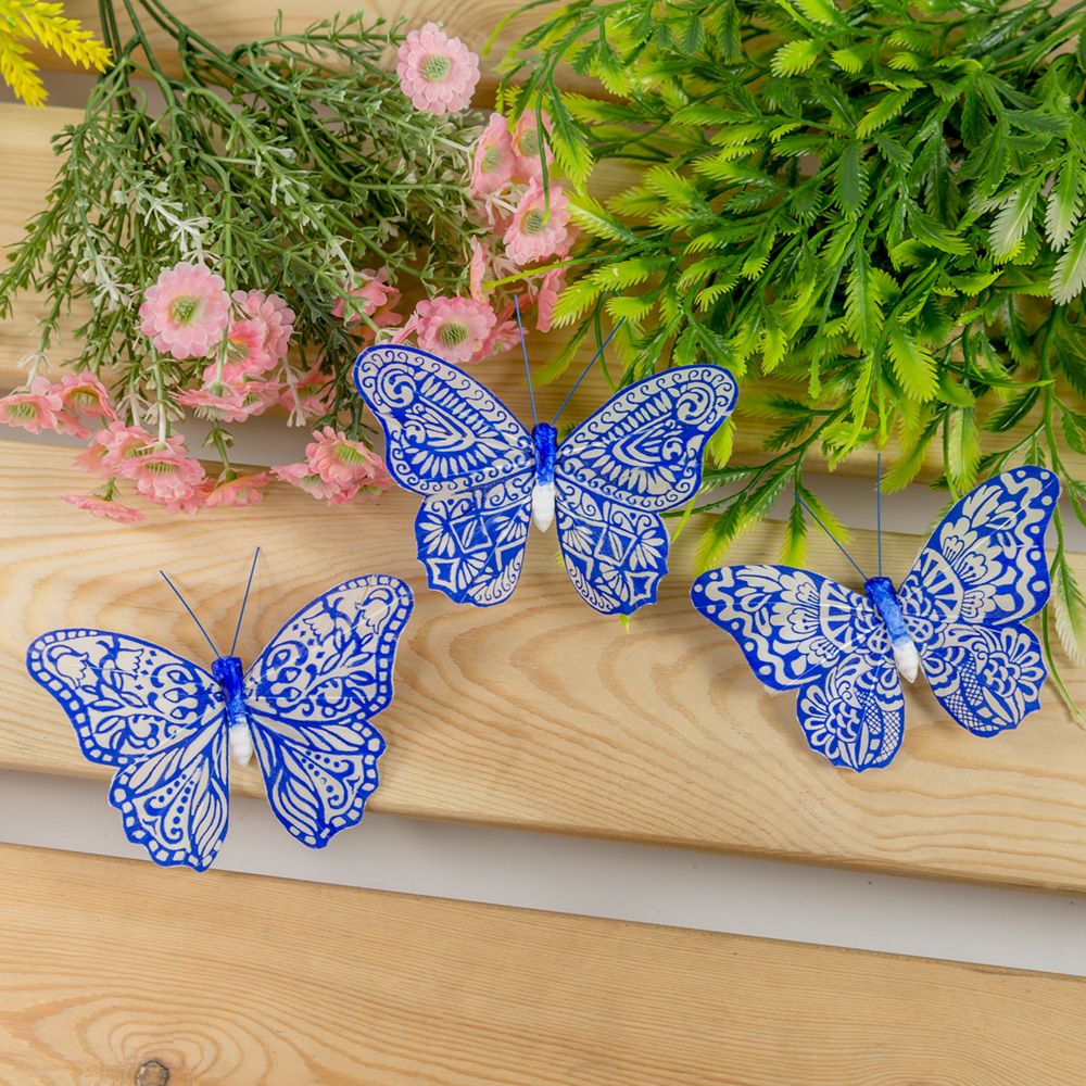 Artesanía de mariposas para decoración de paredes.