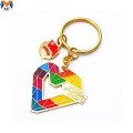 Dearadh saincheaptha miotail keychain greanta