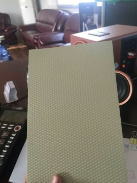 Textured steel coil and sheet