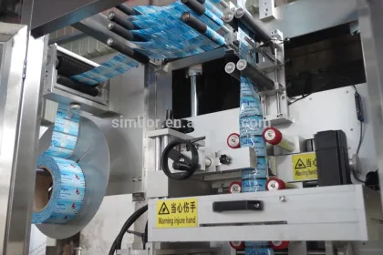 automatic sauce bottle label sleeve labeling machine