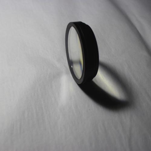 Coating achromatic lens edge-inked for camera lens