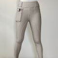 Pantalones de pantalones ecuestres de mujeres gris claro con bolsillos