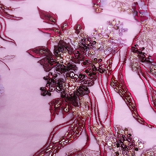 Różowy wzór haftu tkaniny różowy