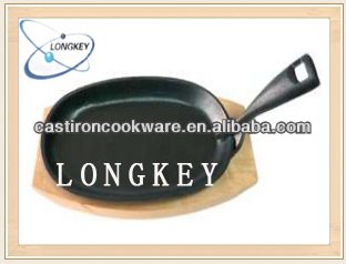 New Products Cast Iron Oval Sizzling Plate with Wooden Base for 2014