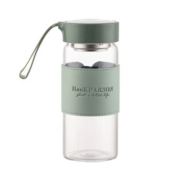 Bottiglia d'acqua in vetro borosilicato con manica in pelle e infusore da tè - 16 once