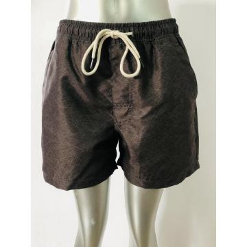 Herrstrandshorts med brunt fint tryck