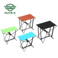 Camp with folded little stools