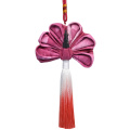 Bolsita étnica con colgante de borla de pavo real de algodón tie-dye