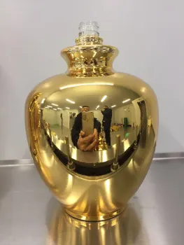 Automated metallized wine bottles