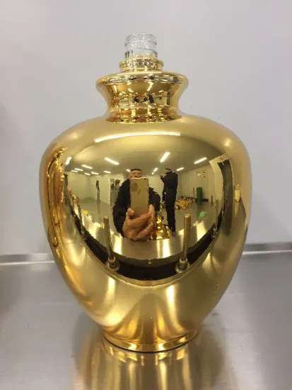 Automated metallized wine bottles
