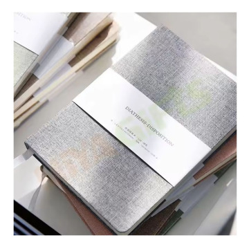 Jurnal Perancang Custom Notebook Diary dengan penutup kain linen dan logo sulaman kerajang