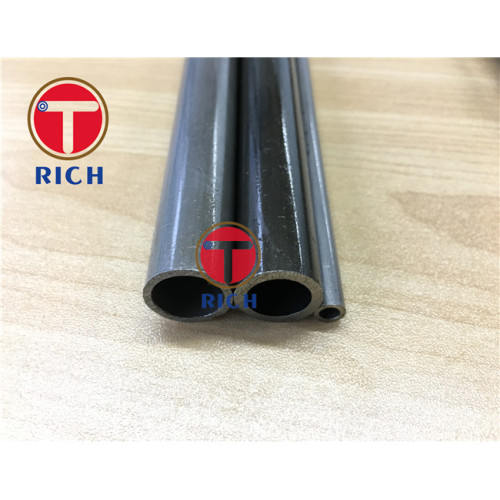 Seamless carbon steel tubes for high temperature service