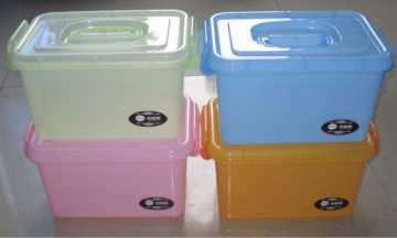 Colorful plastic storage bins with wheels for sundries