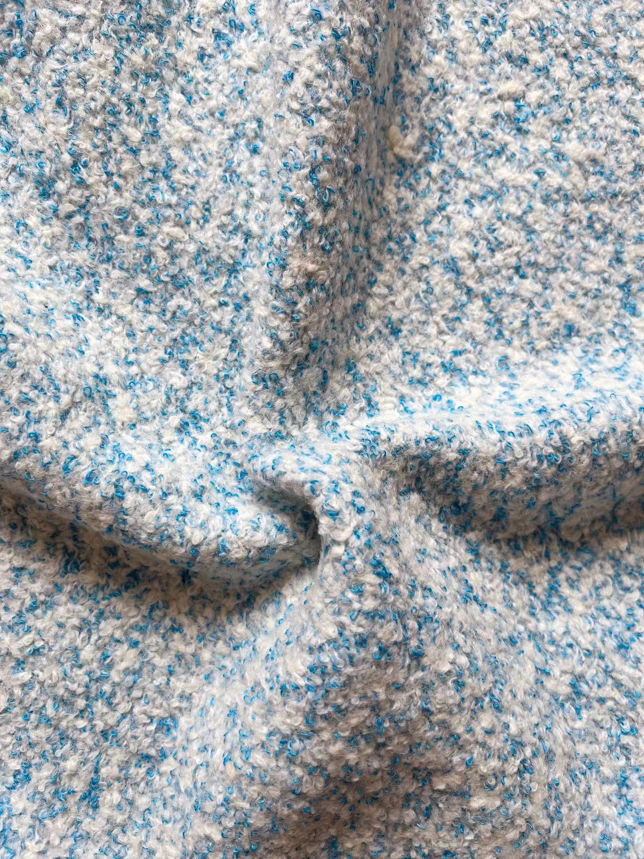 Knitted boucle wool polyester fabric for melange colours