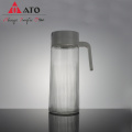 Carafe in vetro quadrato ato con vetro di succo di manico