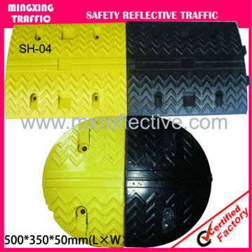 yellow rubber round speed bump