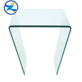 Bent double toughened laminated glass panels