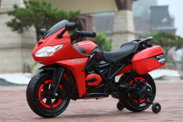 Red two-wheeled children motorcycle