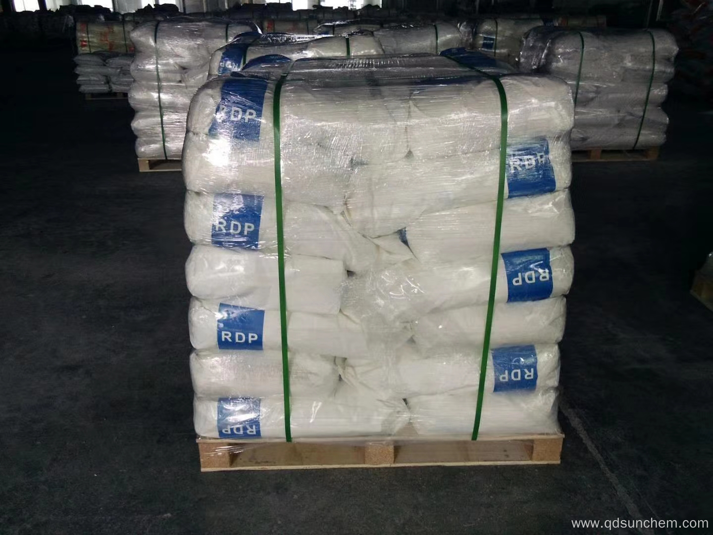 Cement additive redispersible powder