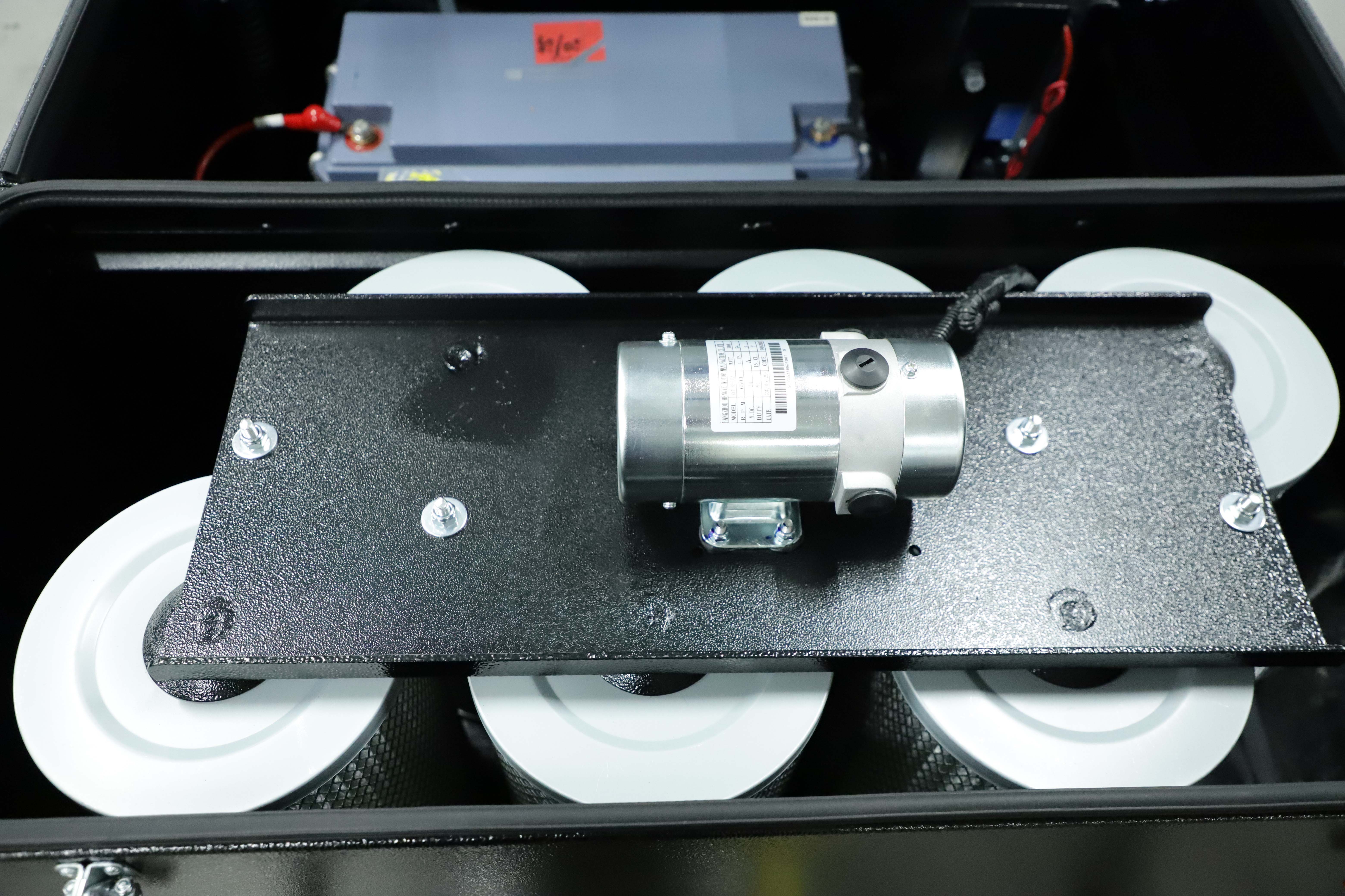 Ride-on floor sweeper