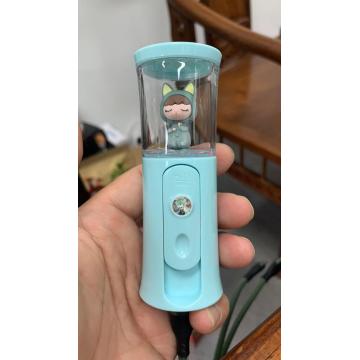Mini electric spray bottle hydration device