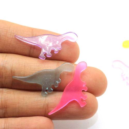 Vente chaude dinosaure Transparent résine Cabochon 100 pièces / sac pour bricolage jouet décoration ou artisanat ornements perle charmes