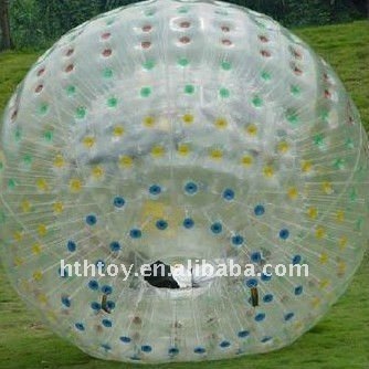 Human Zorb Ball Zorbing on Grass zorb ball