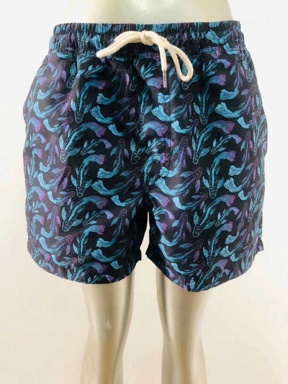 Blue and purple koi print men's beach shorts