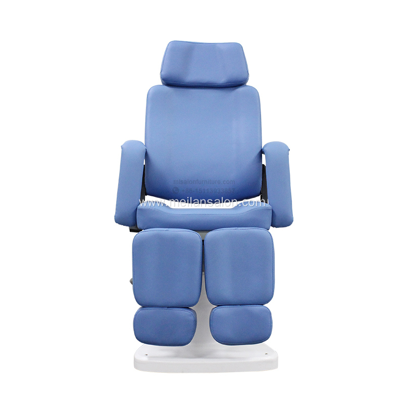 Hydraulic podiatry chair with footrest