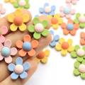 Μαζικά 100 τεμ. 20MM ρητίνη ηλιέλαιο Cabochons Kawaii 3D ρητίνη μαργαρίτα σε σχήμα λουλουδιού επίπεδη πλάτη επίπεδη ηλιέλαιο γούρια