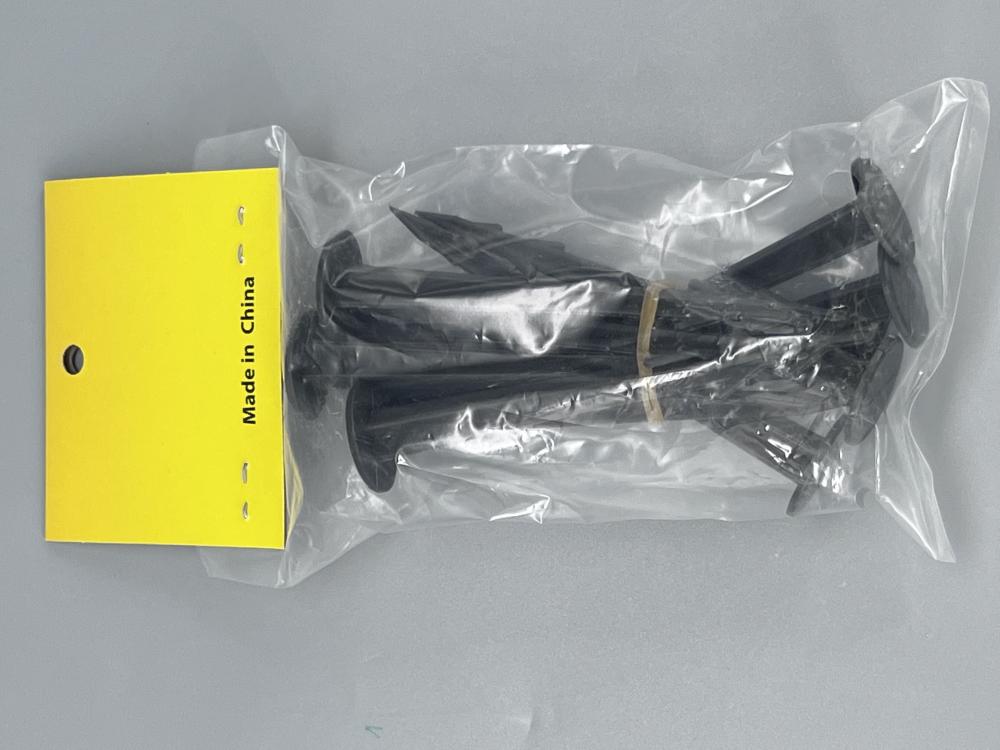 Plastic pegs for securing weed mats and tents