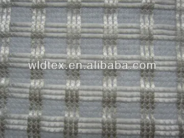 Glass fibre geotextile fabric for reinforced road construction