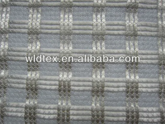 Glass fibre geotextile fabric for reinforced road construction