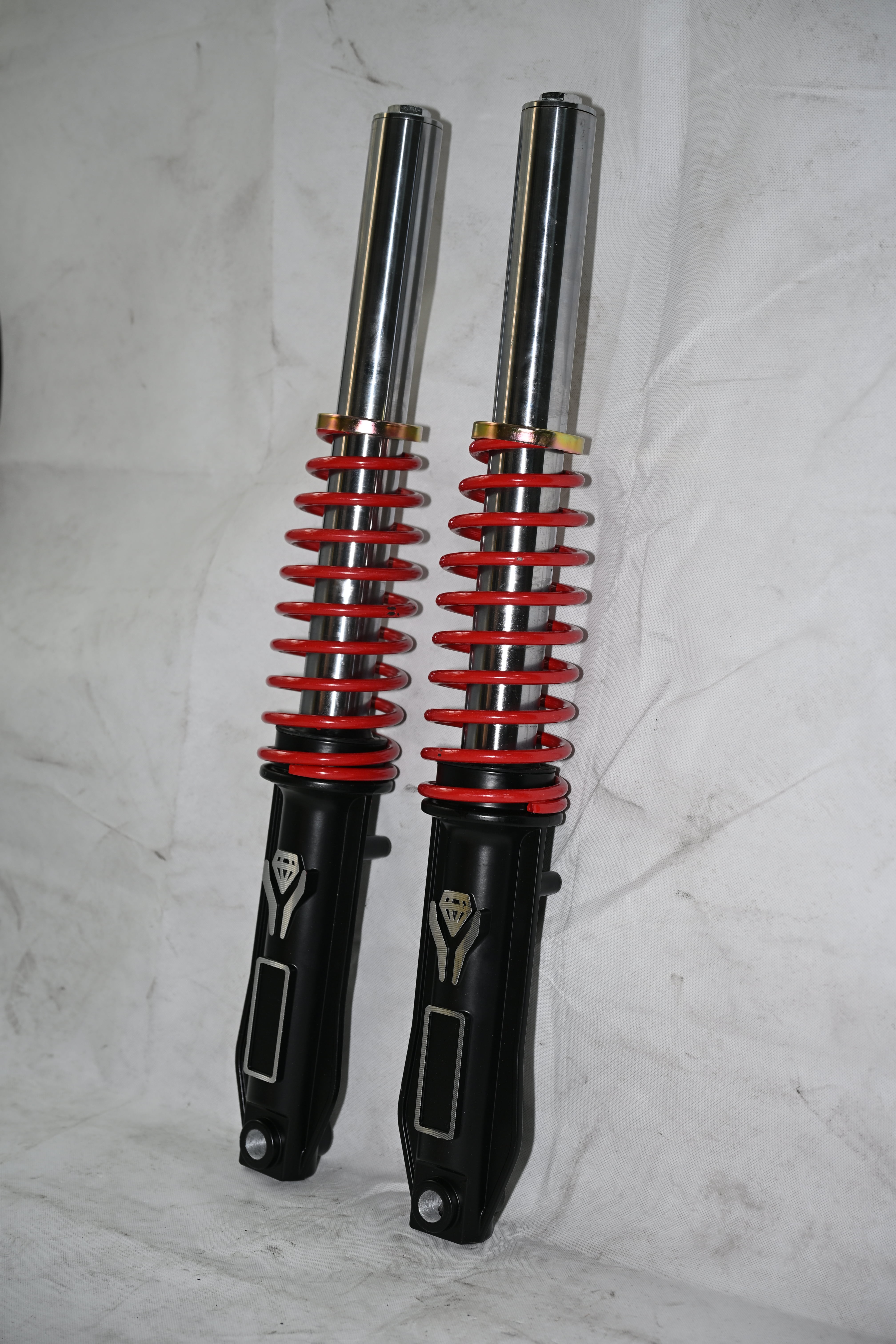 External spring shock absorber
