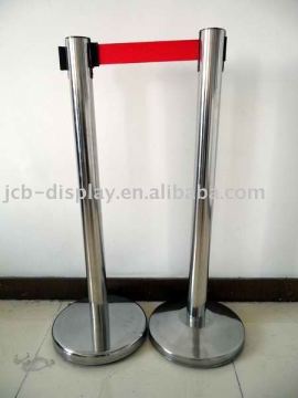 polished stainless steel post with red belt crowd control stanchion