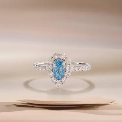 Petite Teardrop Blue Halo Diamond Ring
