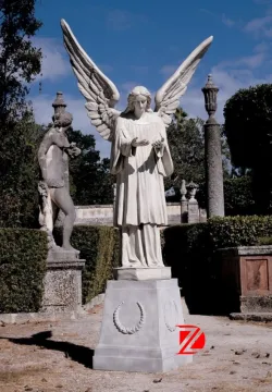 Male angel figurines cemetery