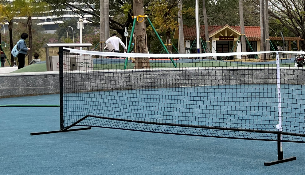 Portable pickle ball post with net