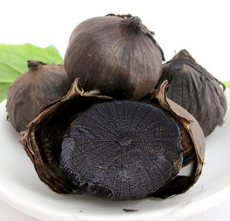 High temperature fermented black garlic