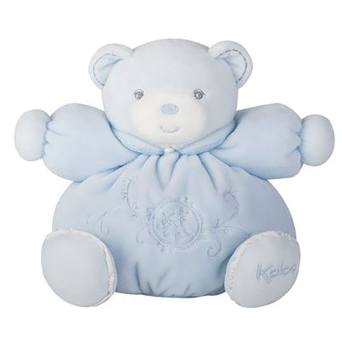 Petit ours blanc farci en pyjama bleu