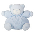 Little white bear stuffed in blue pajamas