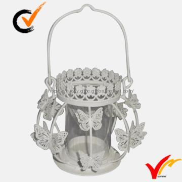 White candle holder with butterfly decoration
