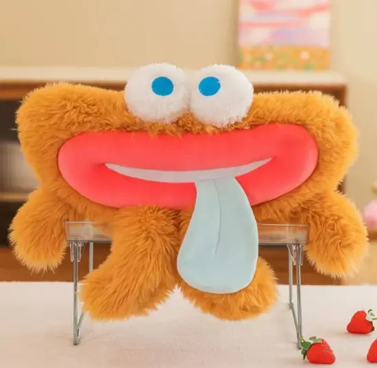 Yellow monster with big red lips stuffed animal