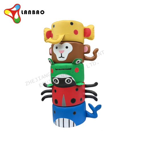 Cartoon-Themed Children's Indoor Play Area with Circular Stools and Soft Equipment