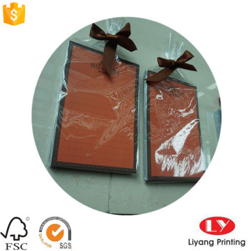 Luxury notepad with plastic bag and ribbon