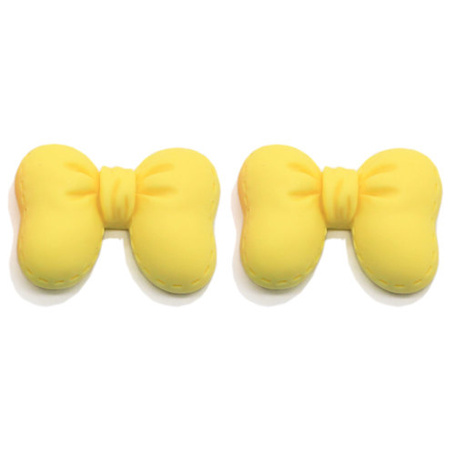 Échantillon gratuit belle Bowknot enfants cheveux arc accessoire breloques Kawaii résine artisanat décoration Mini embellissements