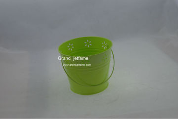 homeware die cut flower green metal candle pail