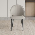 Chaise de salle à manger beige rembourrée avec des jambes en métal élégant